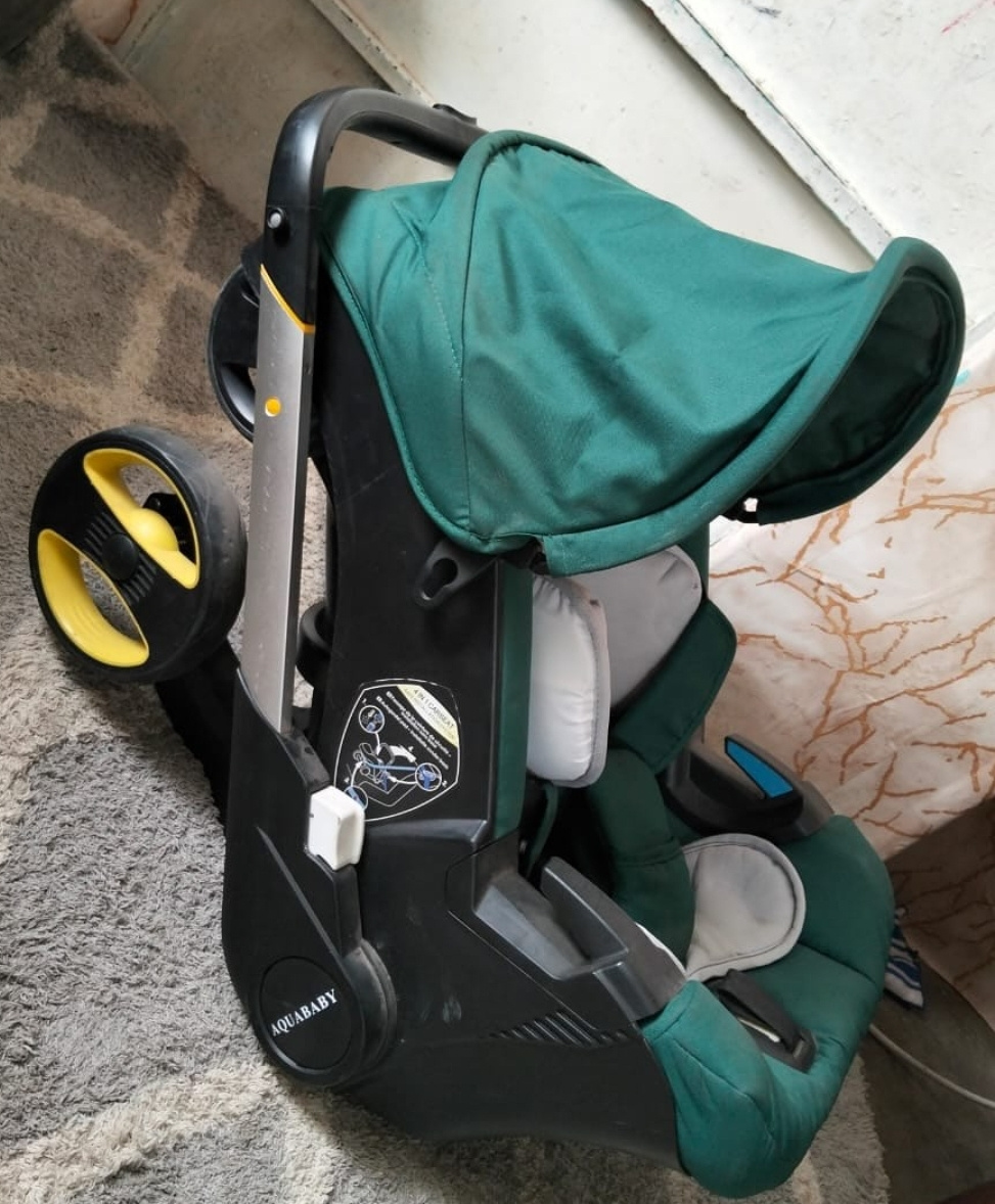 4-in-1 Racing Baby Stroller Travel System with Infant Car Seat, Carrycot & Rocker – Green, Black & Grey | LuxeHomeHub Kenya